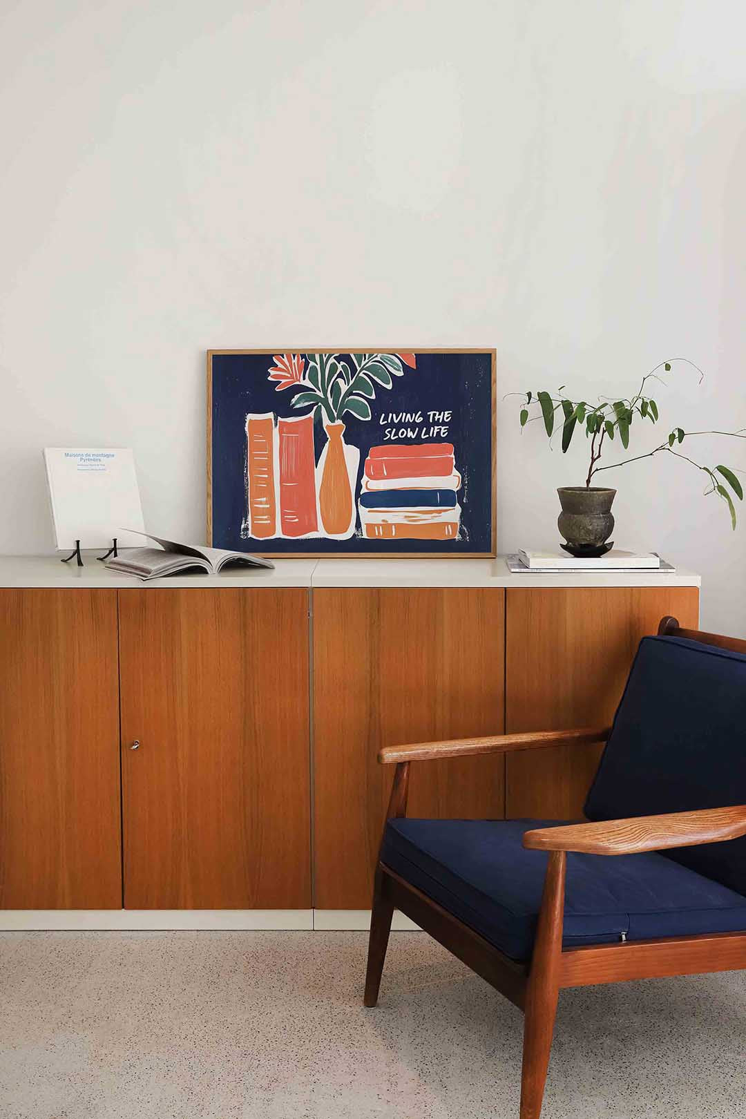 Boeken en vaas met bloemen Poster