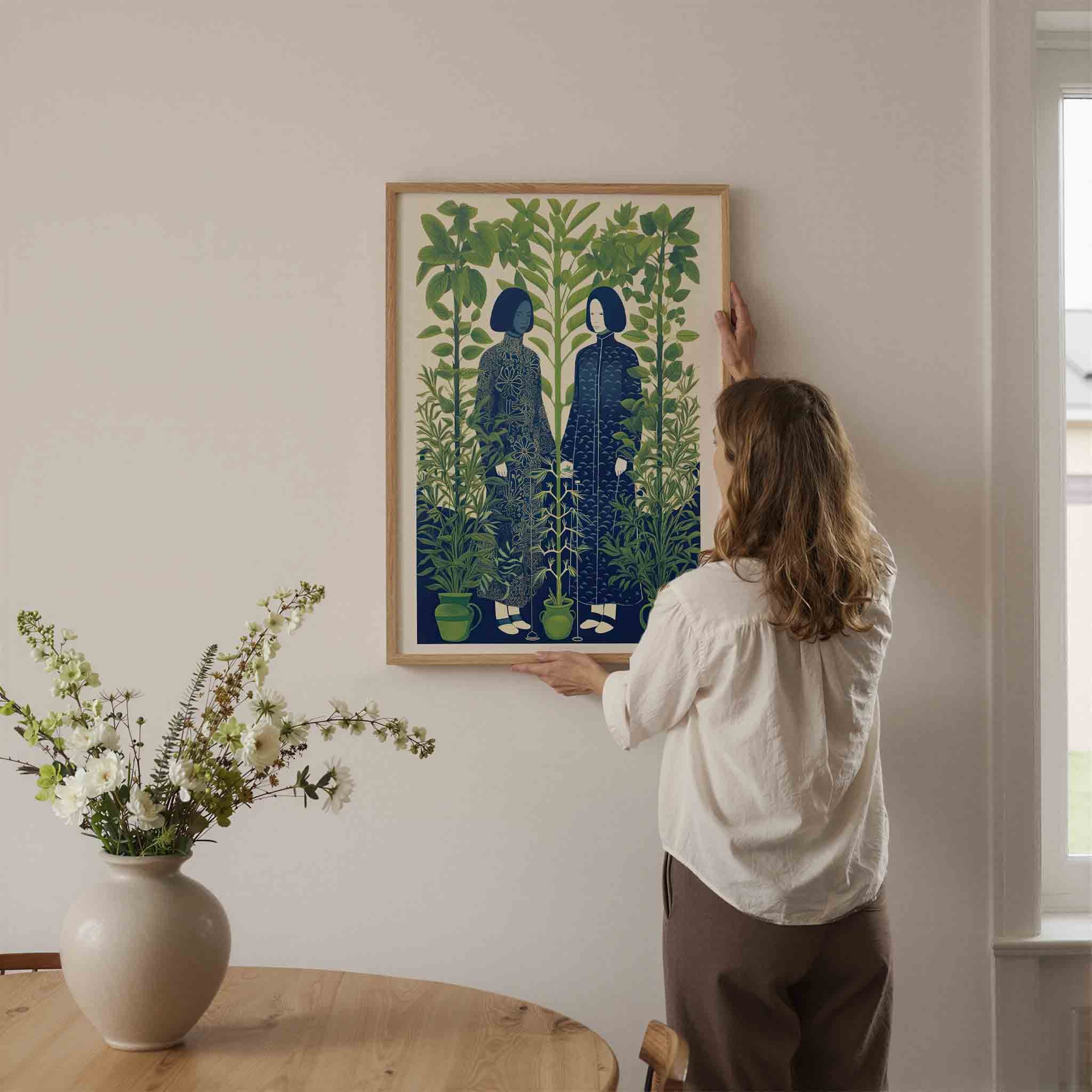 Twee figuren tussen planten Poster