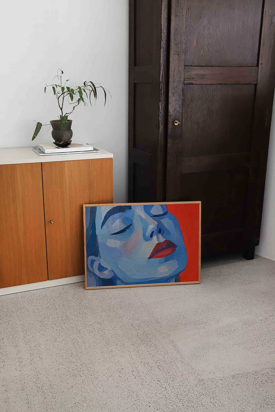 Blauw gezicht met rode achtergrond Poster