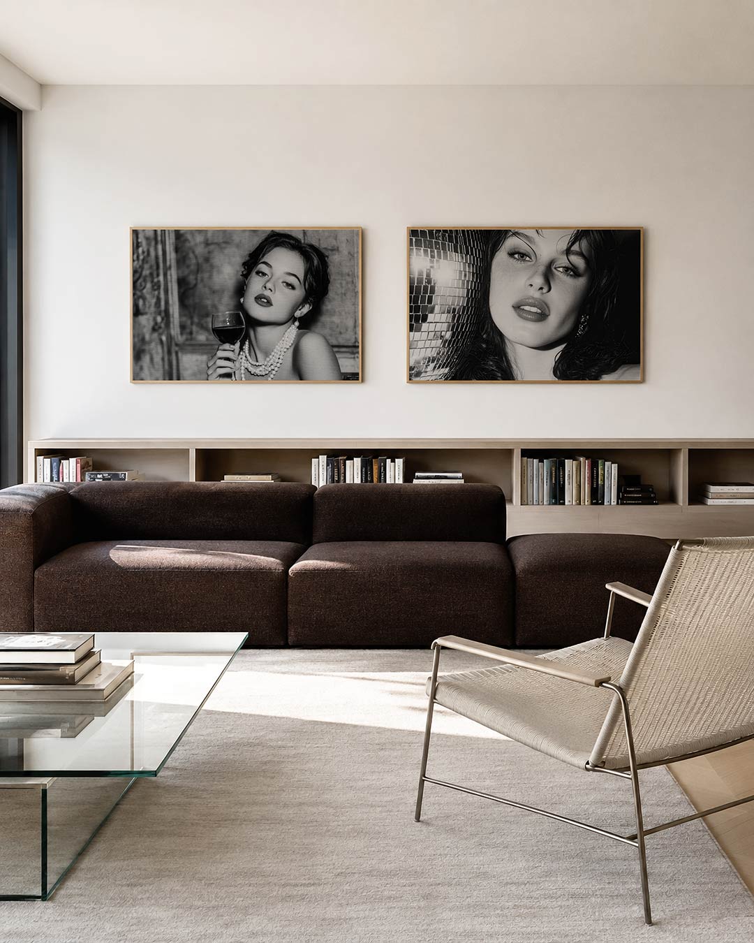 Twee liggende posters met donkere tinten en een rustige visuele opbouw, aan de muur in een interieur