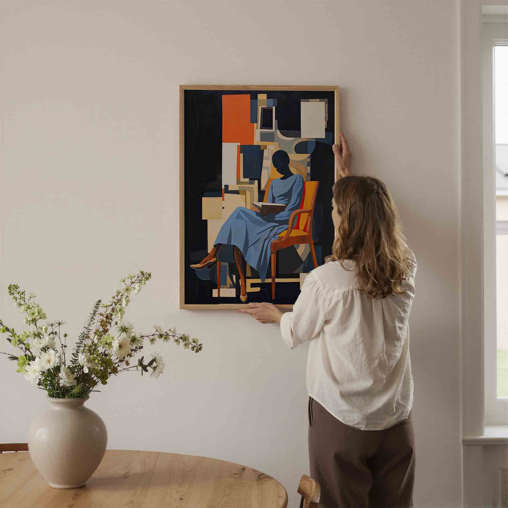 Lezende vrouw in stoel Poster